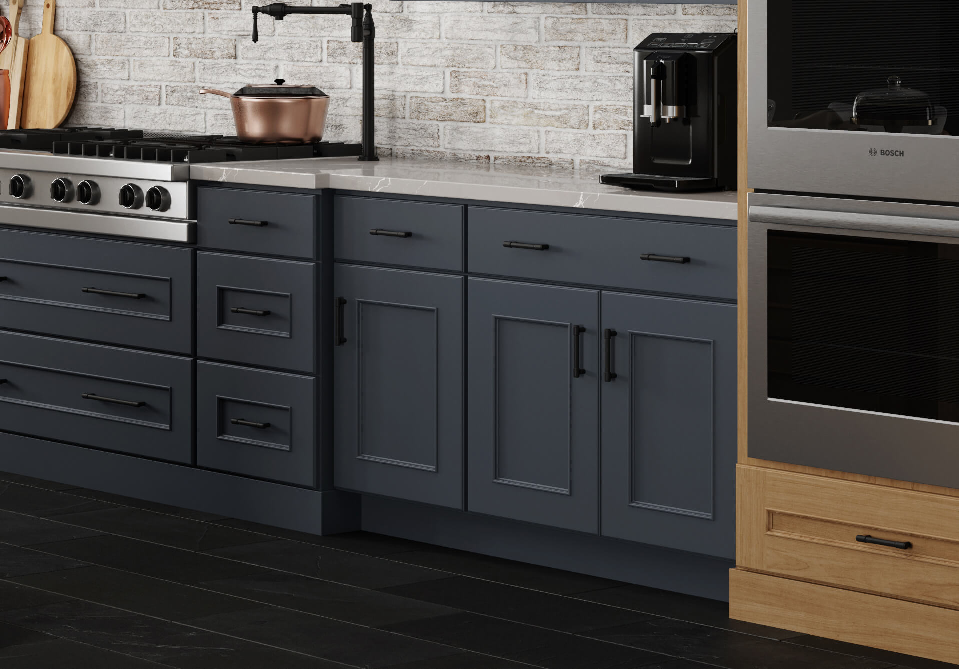 Dark navy blue panted cabinets with warm stained cherry cabinets in an English styled kitchen remodel.