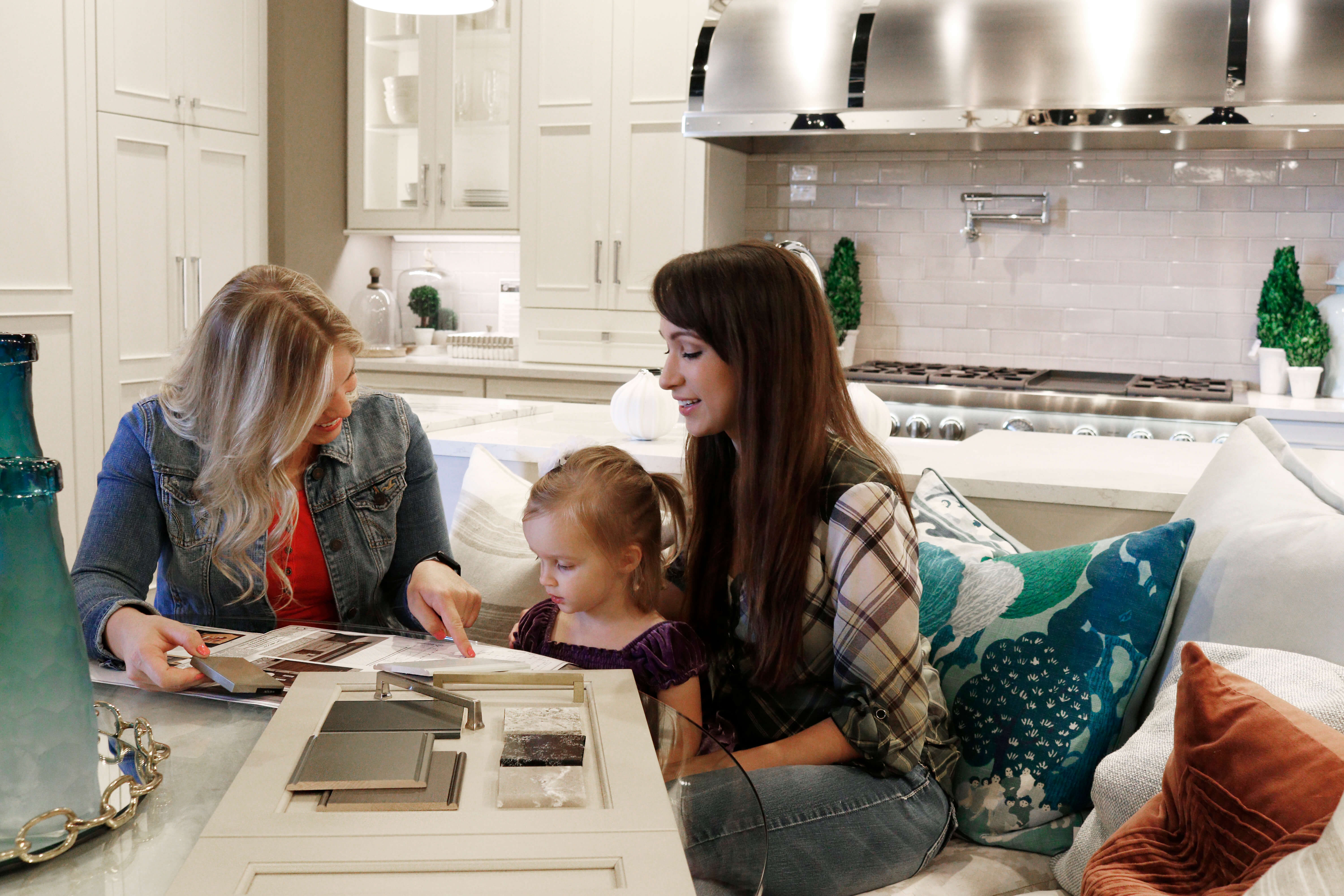 Viewing cabinet samples in person at the Dura Supreme Cabinetry showroom.