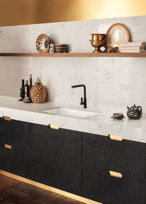 Example of a thicker countertop design. Photo by Corian Designs featuring the Zodiaq® London Sky Quartz countertop.