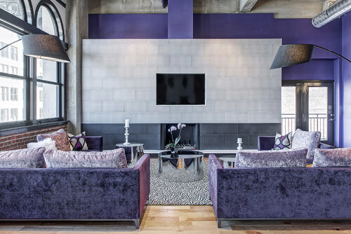 Photo by S&K Interiors and Home Staging featuring a vibrant violet living room design.