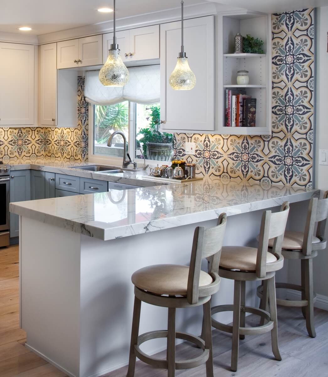 Dura Supreme Cabinetry design featuring Lu'um Mosaics, interior design by Brenda Gold and kitchen design by Jeff West.