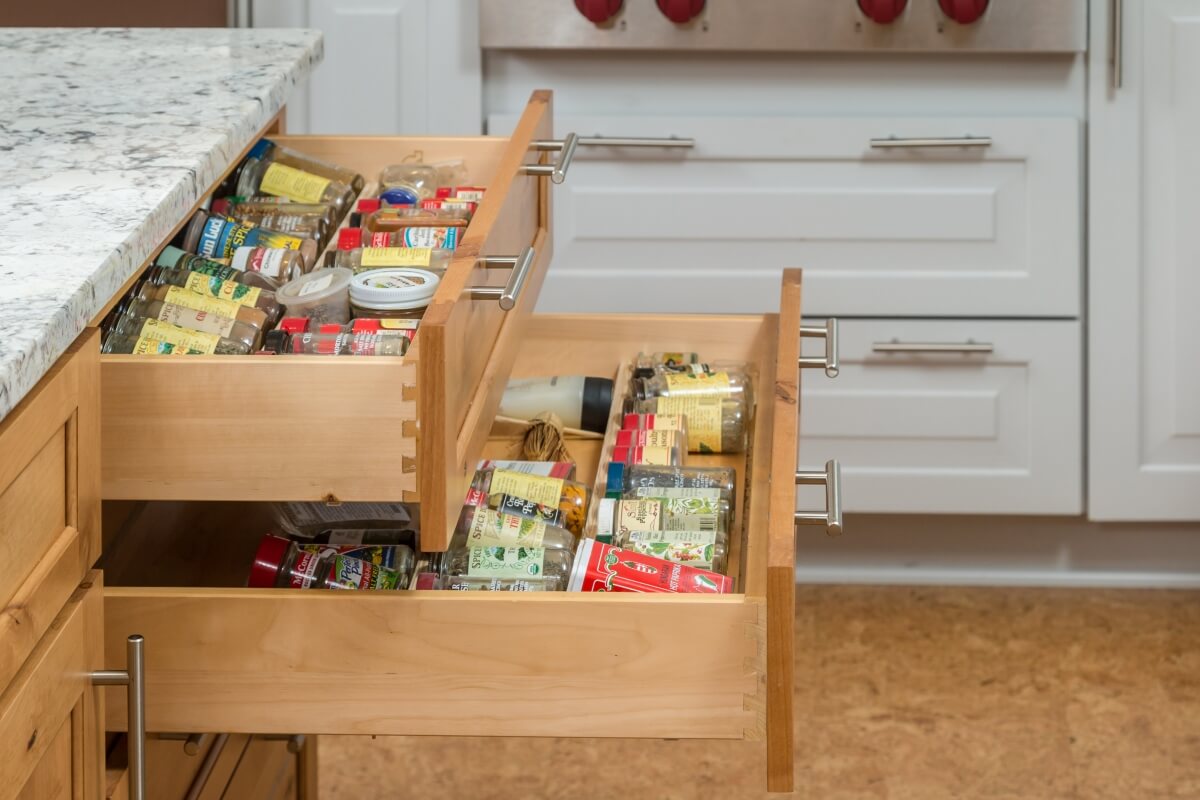 Design by Danielle Bohn, CKBD of Creative Kitchen Designs, Inc. featuring Dura Supreme Cabinetry Spice Rack Drawer.