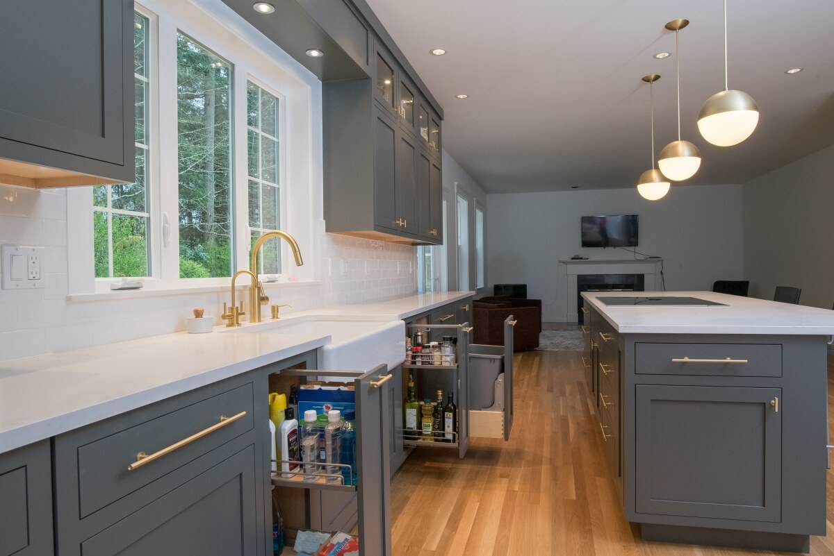 Kitchen design by Molly McCabe, AKBD, CLIPP, CGP, CAPS of A Kitchen That Works, LLC, Washington featuring fray painted Dura Supreme kitchen cabinets and storage.