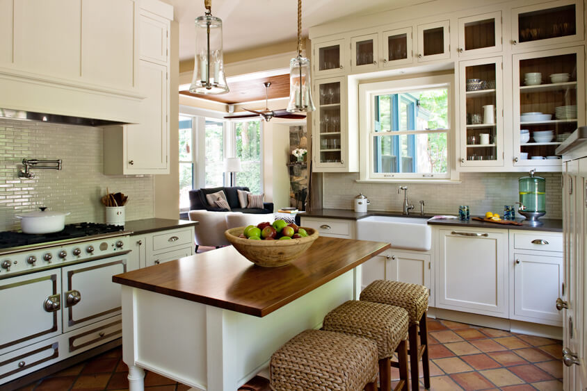 A furniture styled kitchen island with counter height seating. Dura Supreme Cabinetry design by Sandra Brannock & Cynthia Alsaif of NVS Kitchen & Bath Inc., Virginia.