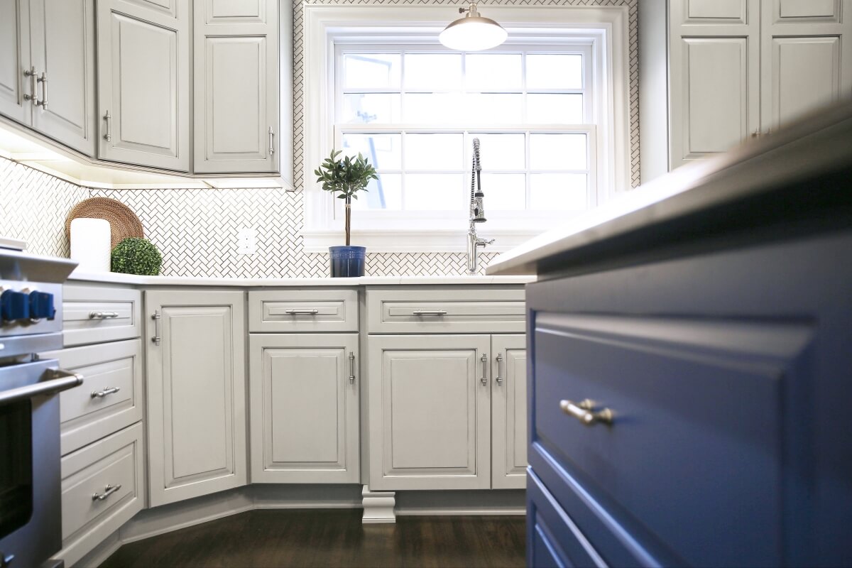 The updated kitchen sink window and additional lighting made the kitchen feel brighter then it did before, even with the elimination of 2 kitchen windows.