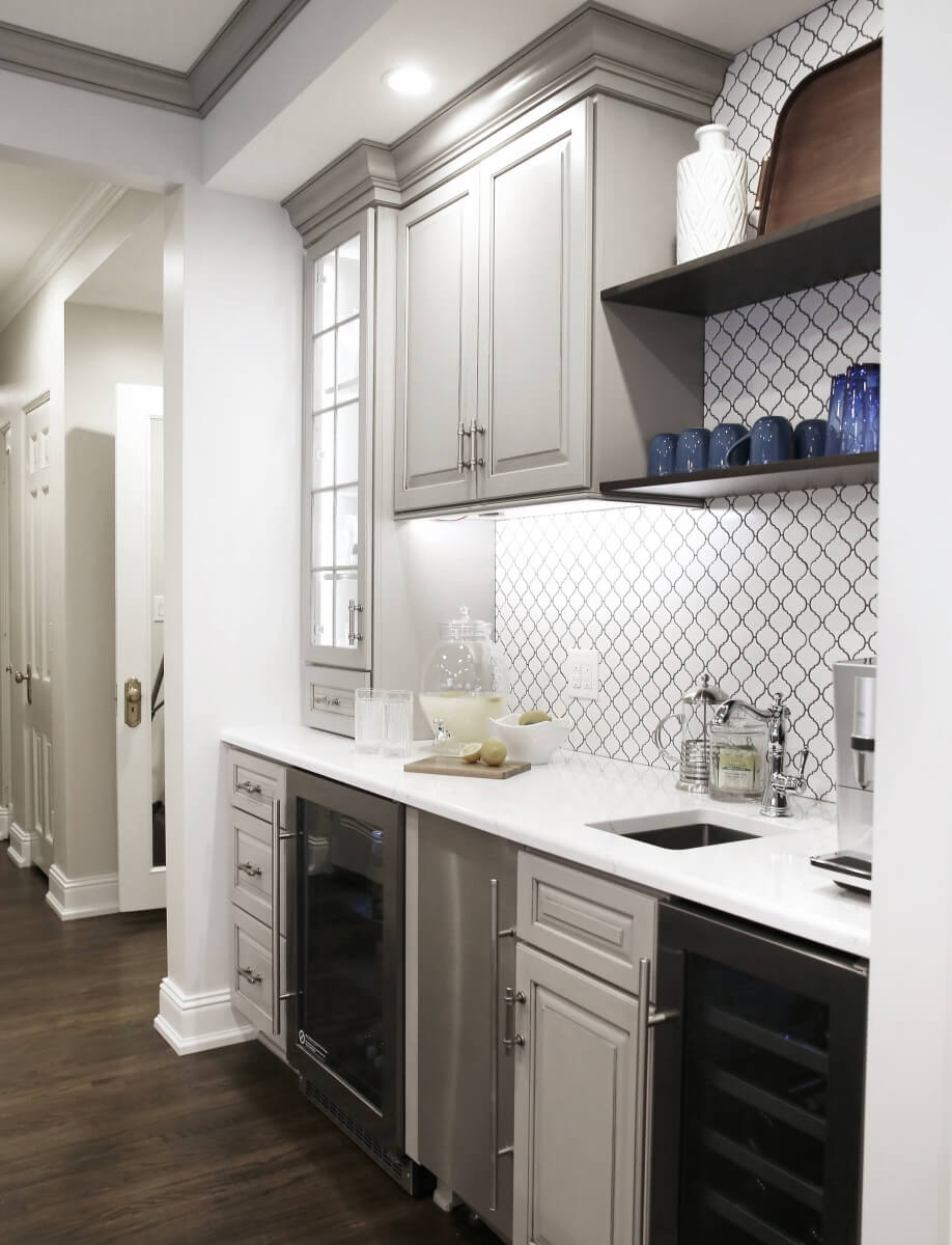 The new wet bar area where the secondary staircase once stood.