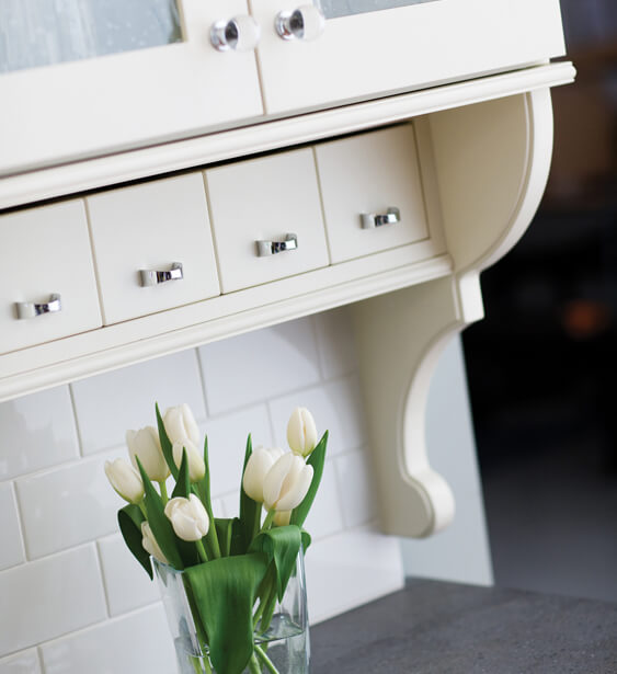 Add a vertical or horizontal row of apothecary drawers to add storage for your misc. items with some cottage flare.