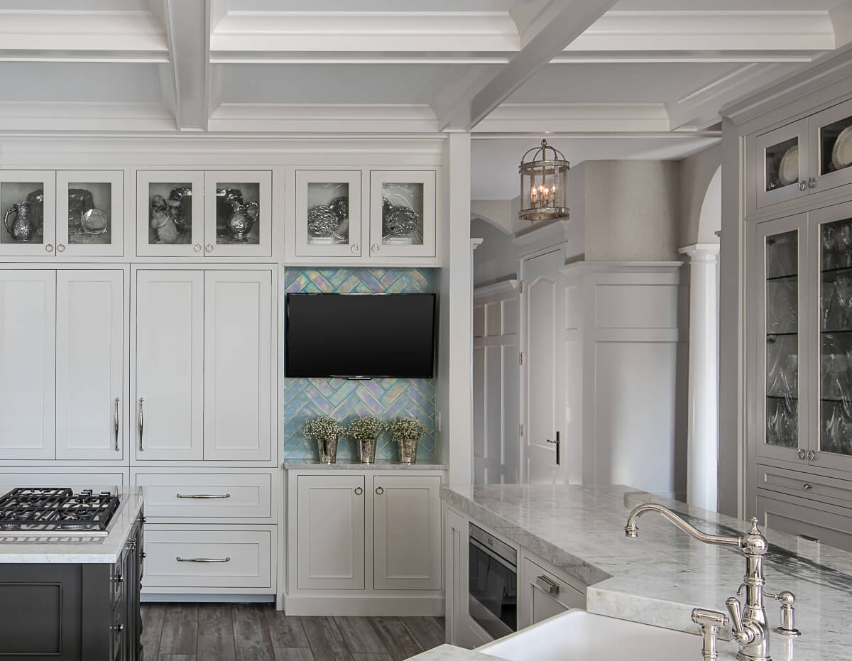 A Dura Supreme kitchen with a cool inspired color palette featuring Dura Supreme's Silverton-Inset door style with a