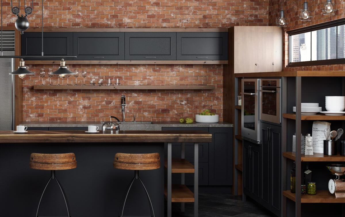 An Industrial style kitchen design in an urban loft with exposed brick walls and ductwork. The modern and rustic cabinets use a black painted finish and accents in a wood with a warm stain. Open shelves and black metal fixtures add to the style.