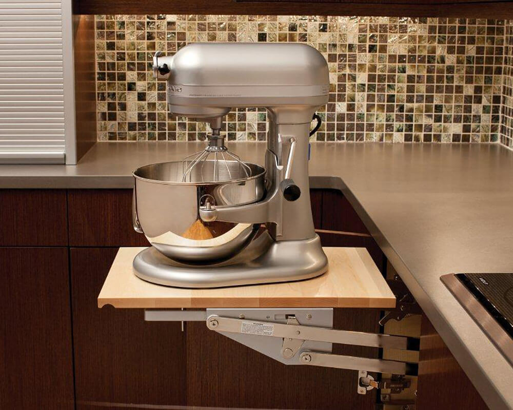 A Kitchenaid mixer or other heavy kitchen appliance can be lifted with ease to countertop level than conveniently stored in its own cabinet without straining your back! There's room for accessories and misc storage in the roll-out shelf below.