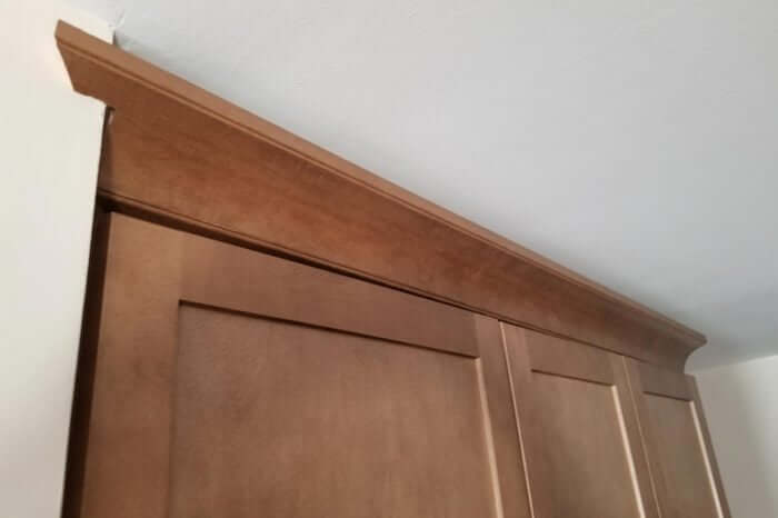 The cabinet crown molding looks like an after-thought here.