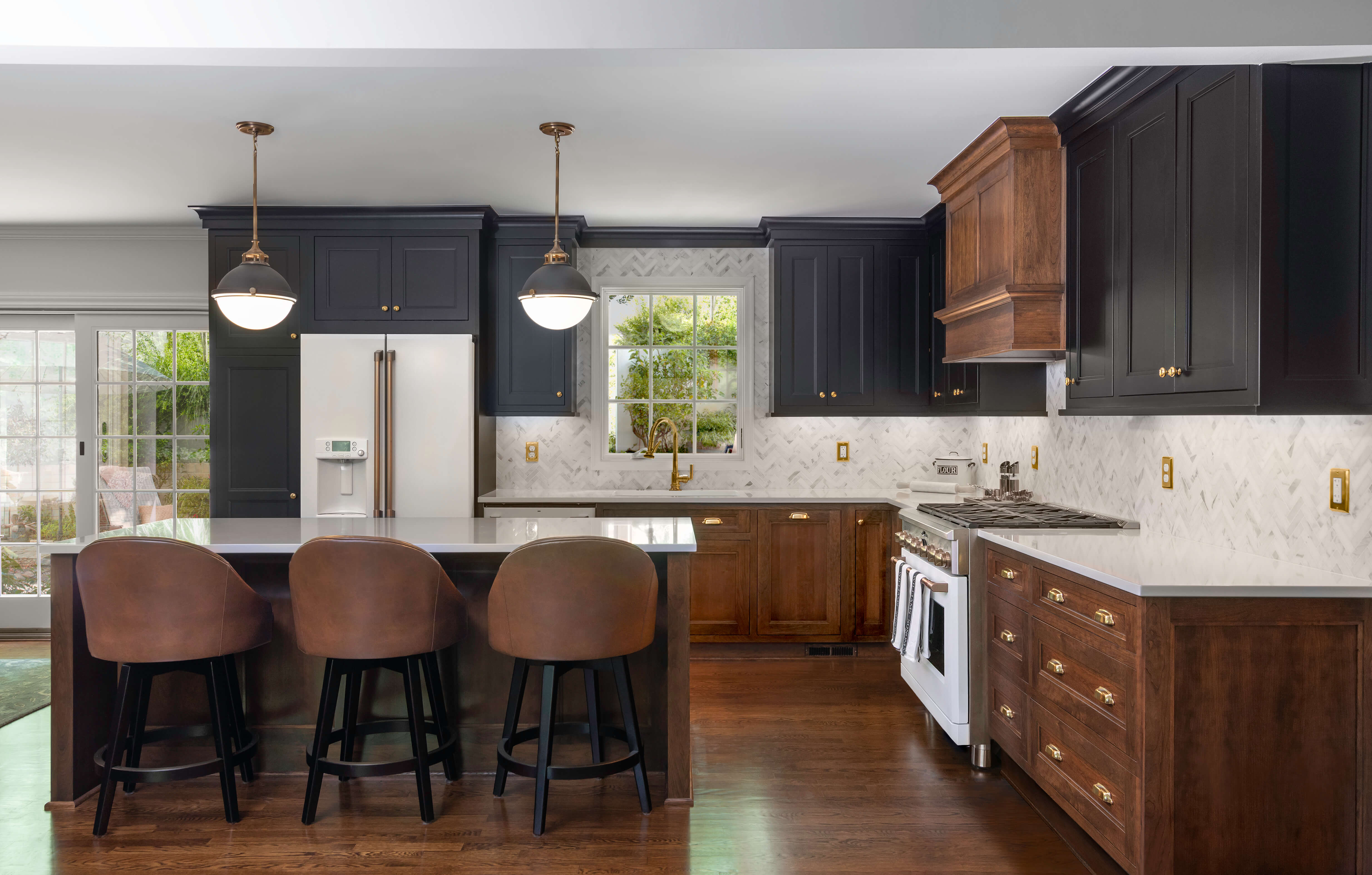 Black and Rich Cherry Wood Create a Romantic Kitchen Design in this newly remodeled kitchen in Virginia. Looking for something different than the white cabinets? Try black painted cabinets!