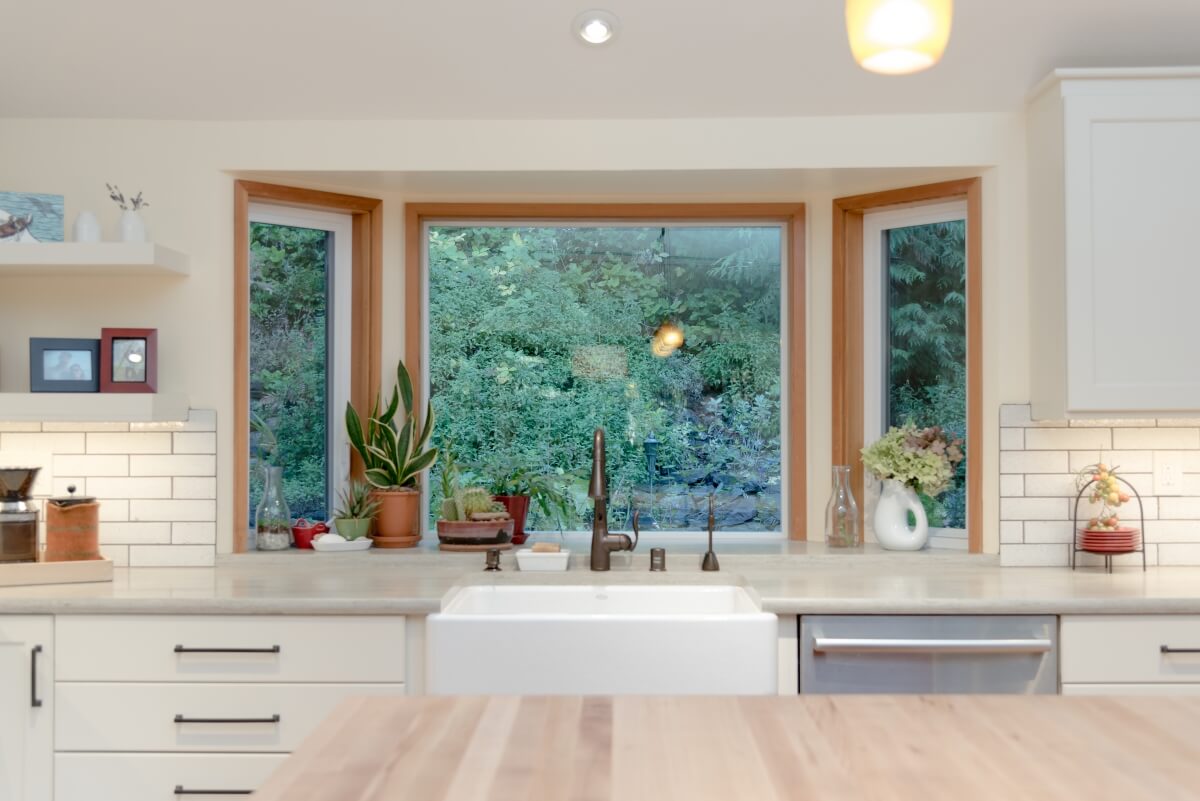 The enhanced kitchen window view. In a Dura Supreme cabinetry kitchen with a modern farmhouse style.