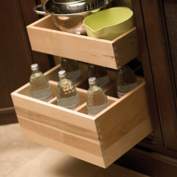 A roll-out bottle rack shelf for beverage center, pantry, or wet bar.