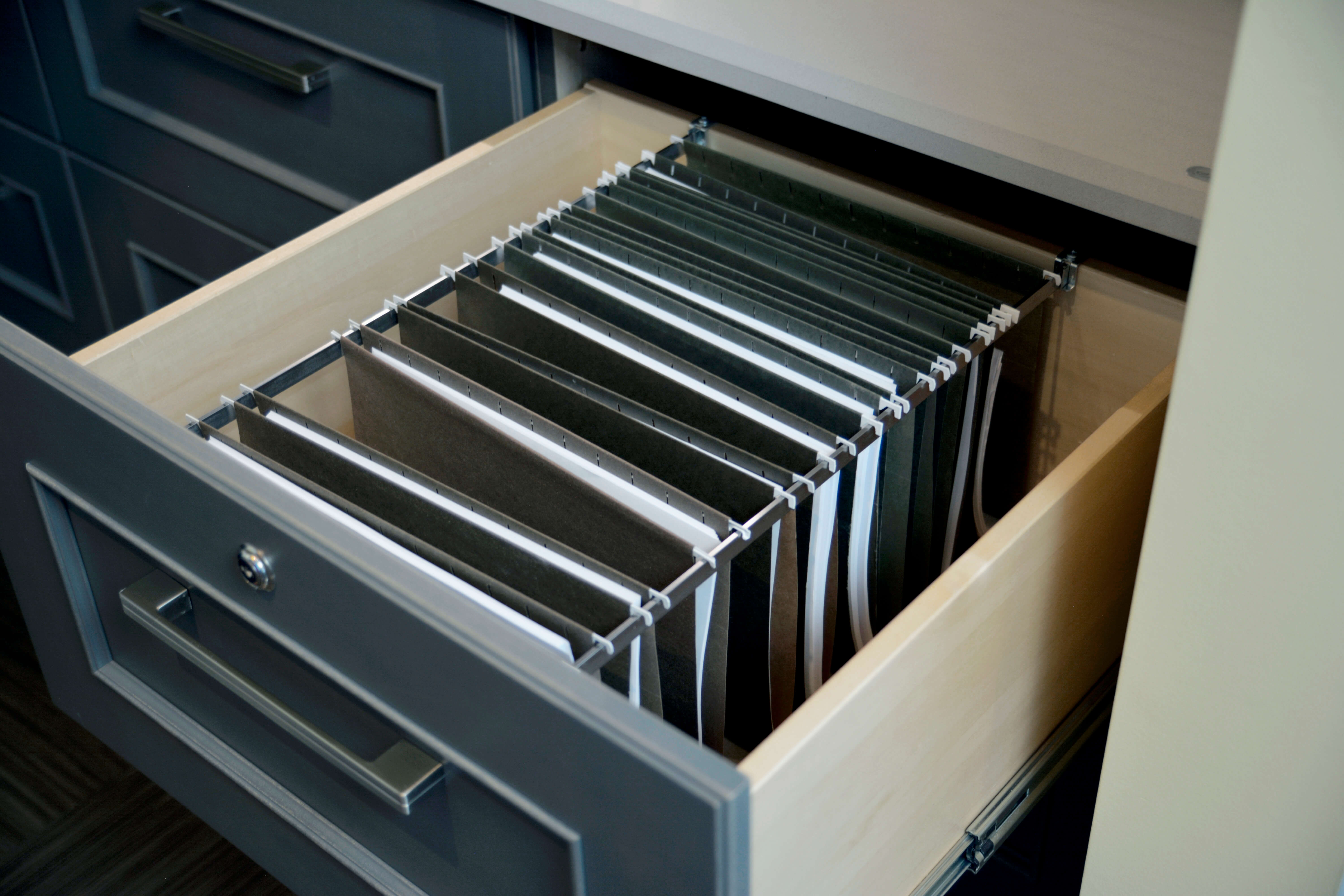 Home Office Cabinetry and Built-in Desk with File cabinet drawer storage. Lateral Standard Drawer by Dura Supreme Cabinetry