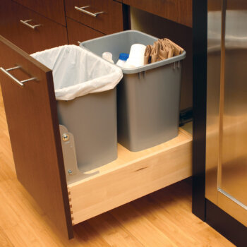 A Full Door Base Recycling cabinet is a great way to keep your kitchen waste and/or recycling tucked away, yet easy to access. Our standard Touch Latch mechanism allows you to open this cabinet easily hands-free with the touch of a knee, when your hands are full or wet, to help keep your kitchen looking spick and span. For additional hands-free opening and closing assistance, an optional SERVO-DRIVE feature is available to electronically open and close this cabinet with the touch of a knee. (Select from a single 50 qt. wastebasket, double 23 qt. wastebaskets, or double 50 qt. wastebaskets.)