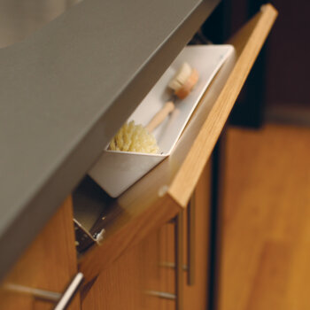 Dura Supreme tip-down sink tray for small items.