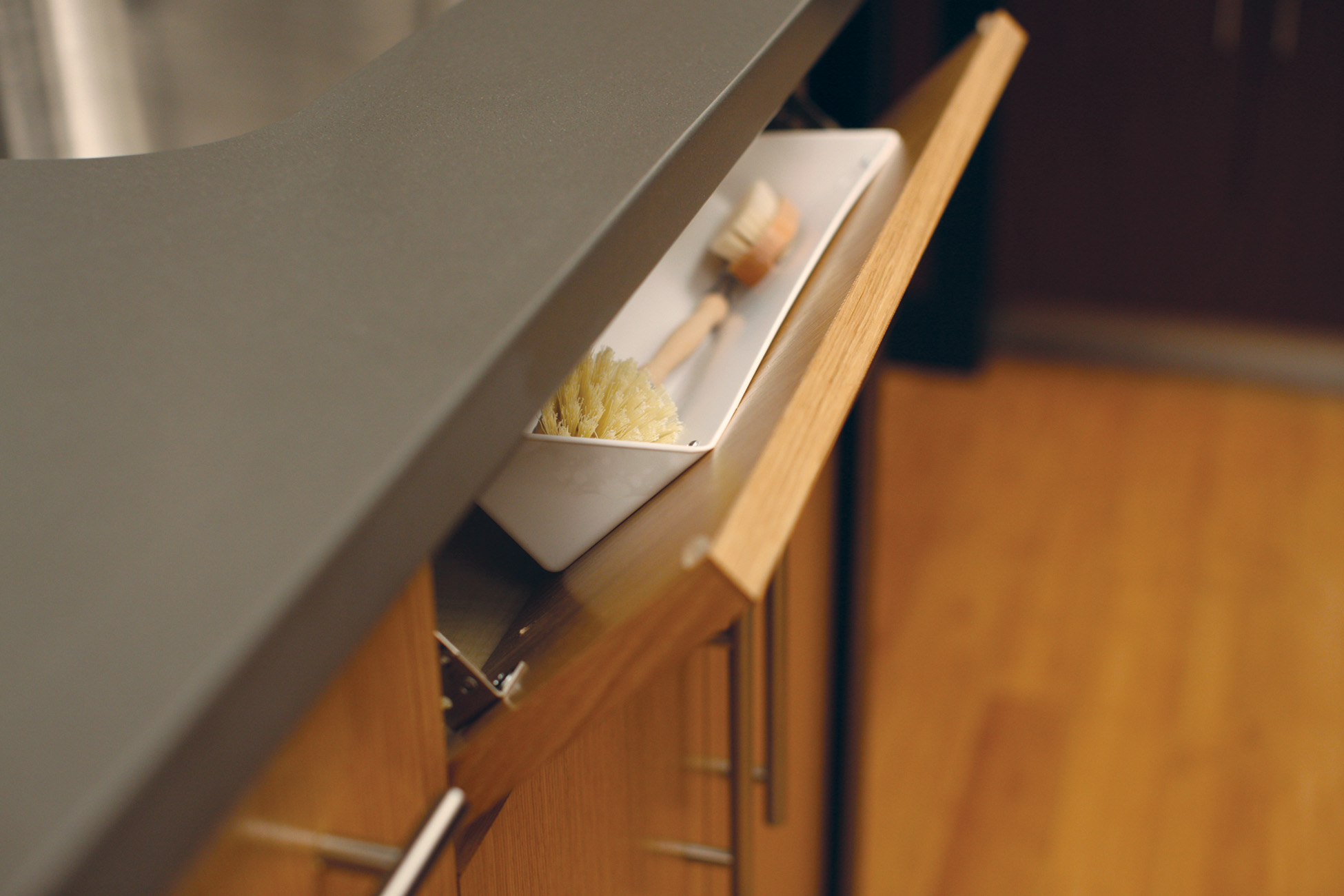 Tip-Down Sink Tray
