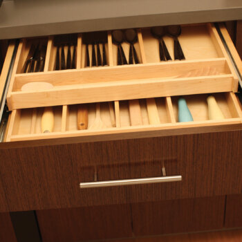 Maximize drawer space with a Two-Tier Wood Cutlery Tray (TTWCT-A) to organize silverware and utensils on two levels within the drawer.