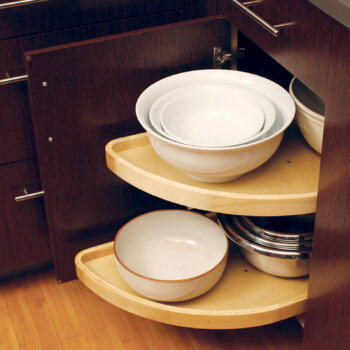 Blind Corner Cabinet storage accessory with accessible pivoting shelves.