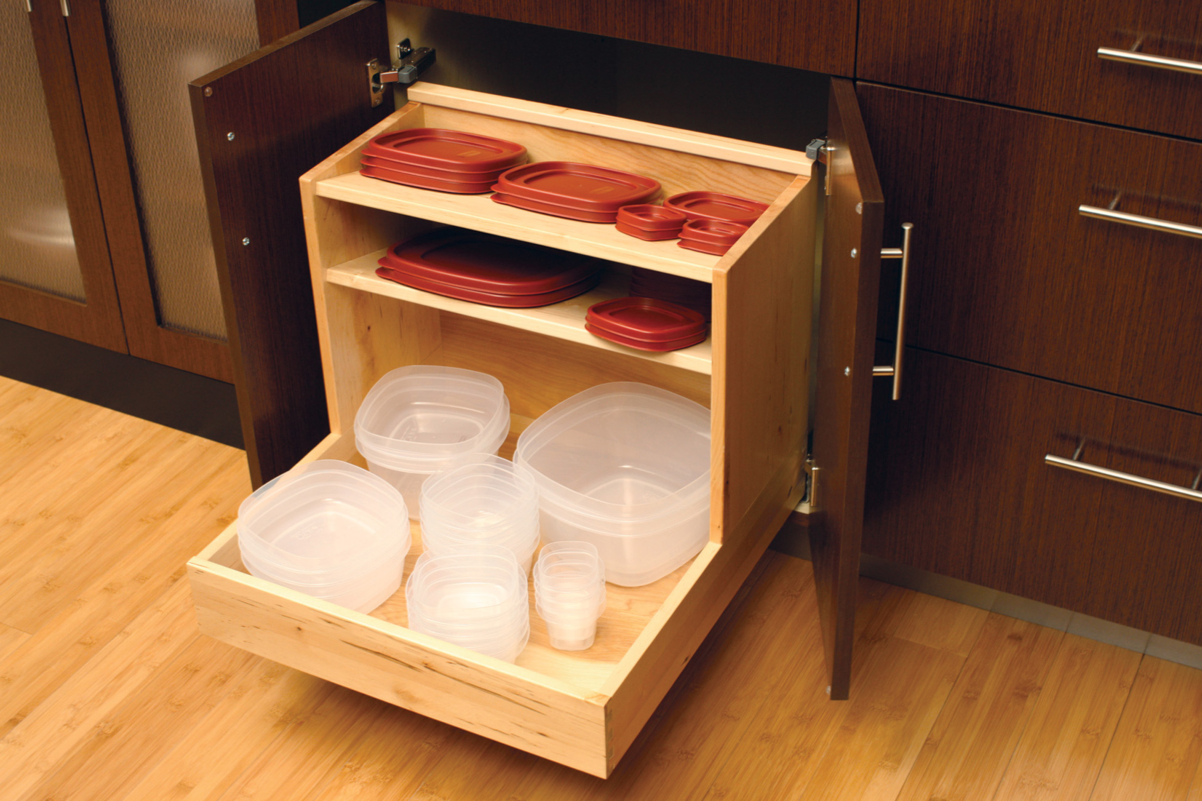 Neatly store your plastic storage containers and lids in this convenient roll-out accessory from Dura Supreme Cabinetry.