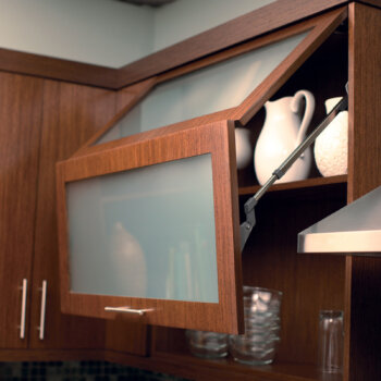 A Bi-fold Lifting Cabinet Door from Dura Supreme Cabinetry.
