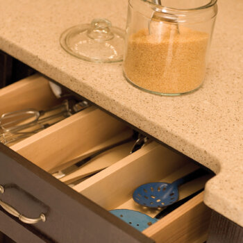 Drawer partitions can be specified to divide a drawer based on your personal preferences. Kitchen Drawer Storage from Dura Supreme Cabinetry.