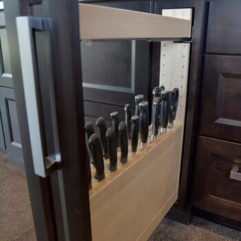 Pull-Out Slotted Knife Block Cabinet from Dura Supreme Cabinetry. Kitchen Cabinet Storage options for cutlery, knives, and utensils.