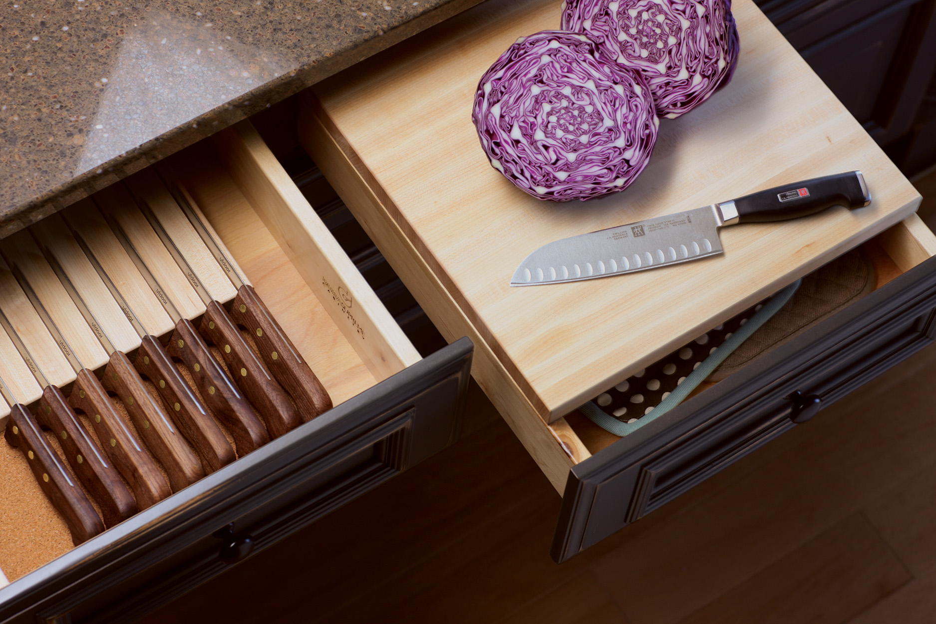 A chop block with drawer and drawer knife holder placed side by side to optimize the food prep process.