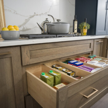 Adjustable deep drawer partitions for customized large kitchen drawers.