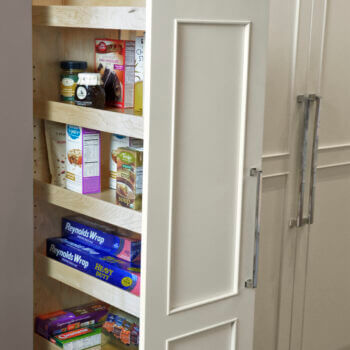 Dura Supreme's Tall Pull-Out Pantry provides an amazing amount of storage on full extension glides. Available with wood (shown) or wired shelves. Discover pantry storage solutions for your kitchen remodel project.