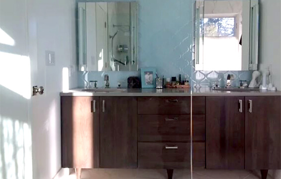 Check out these bathroom cabinet reviews with testimonies from homeowners on their remodel project with Dura Supreme Cabinetry. The customer is very happy with this dark stained modern vanity.