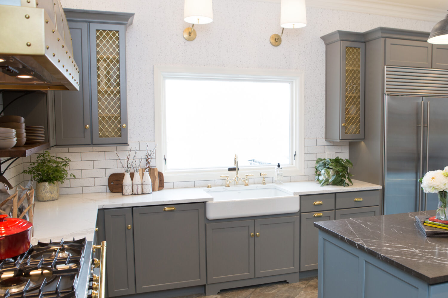Dura Supreme Cabinetry featuring the Kendall Panel door style in a  gray Personal Paint Match finish.