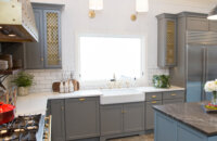 Dura Supreme Cabinetry featuring the Kendall Panel door style in a  gray Personal Paint Match finish.