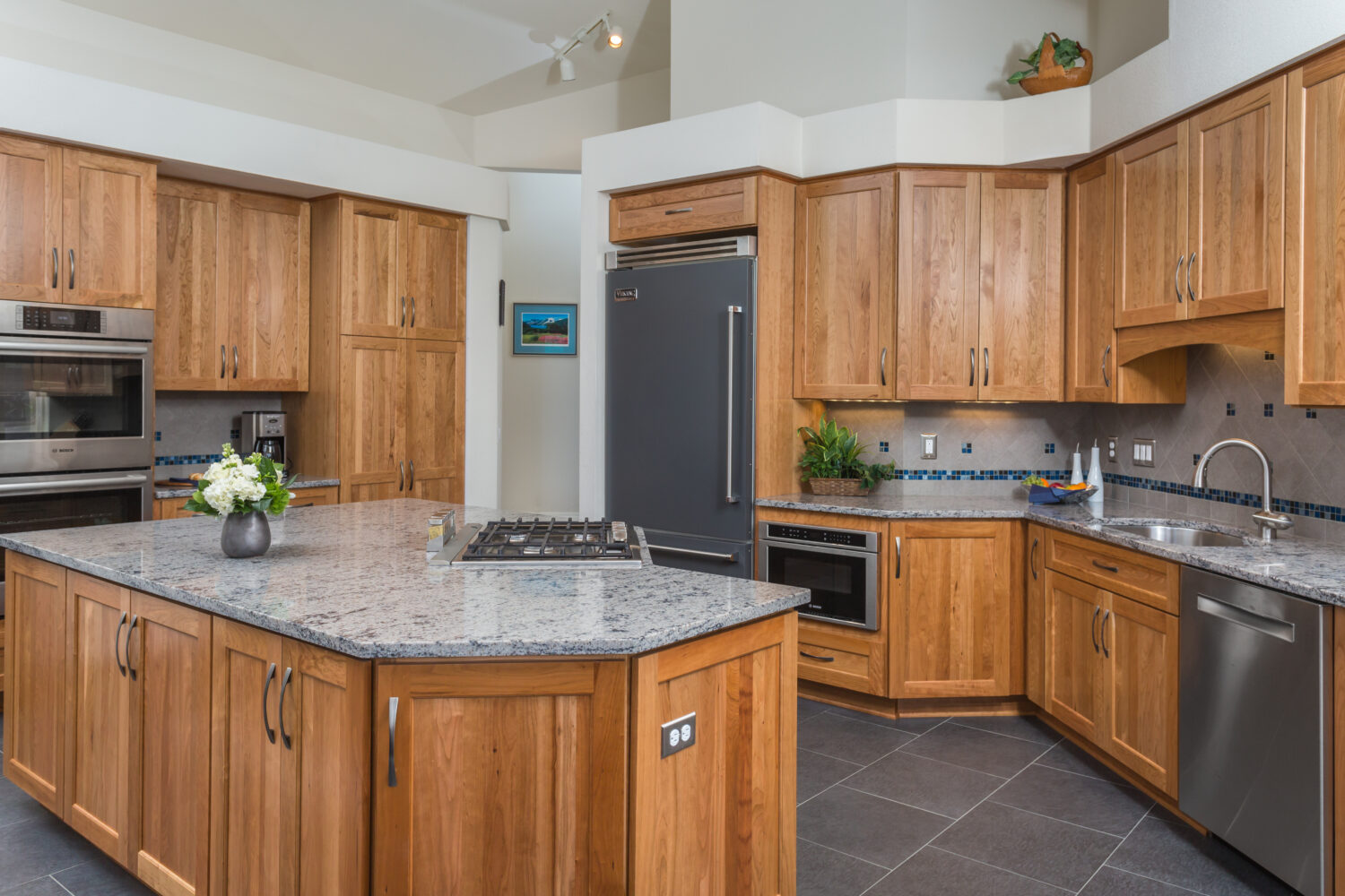 kitchen red wall oak cabinet