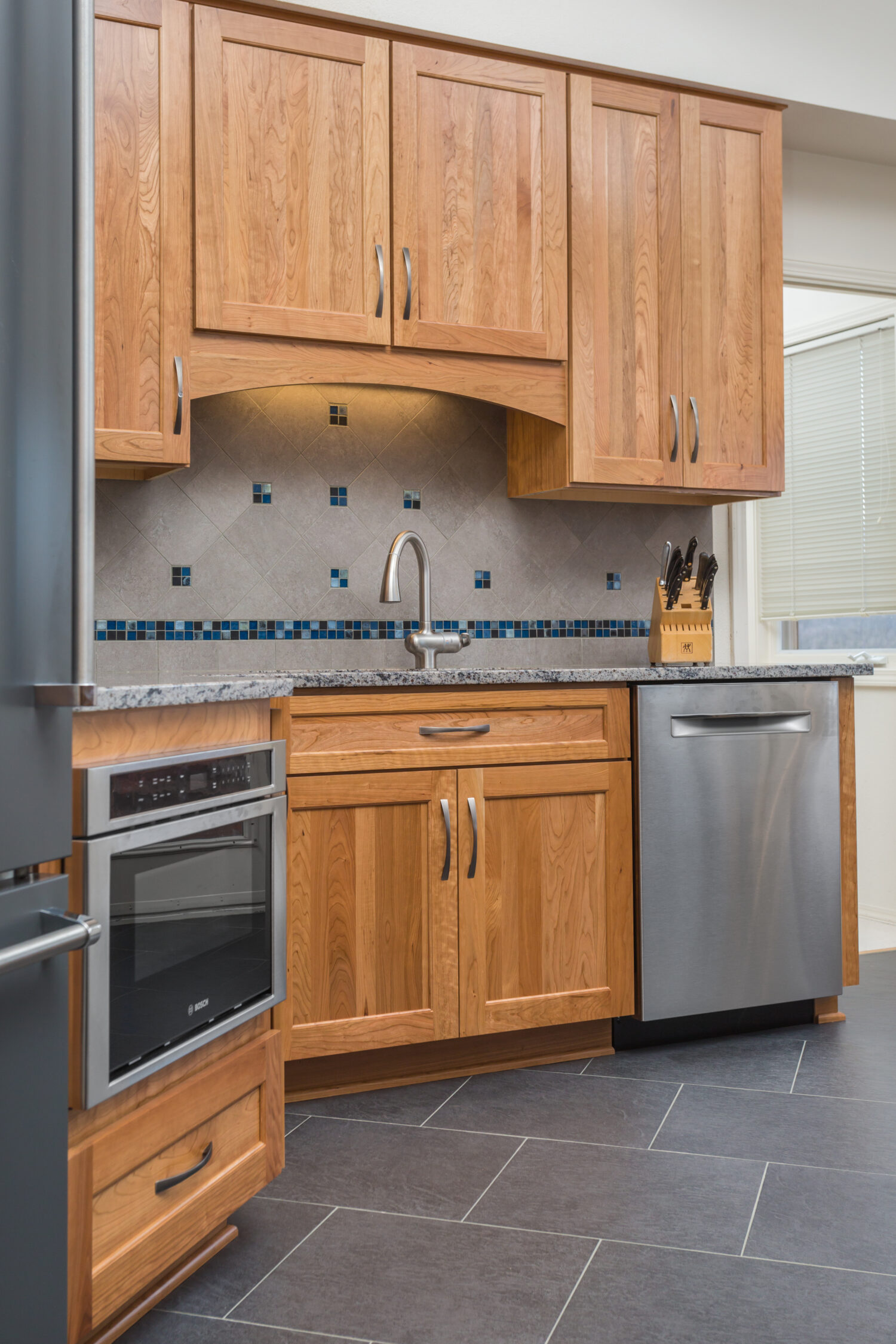 Handsome Red Oak Kitchen Cabinets in an Alaskan Kitchen - Dura Supreme