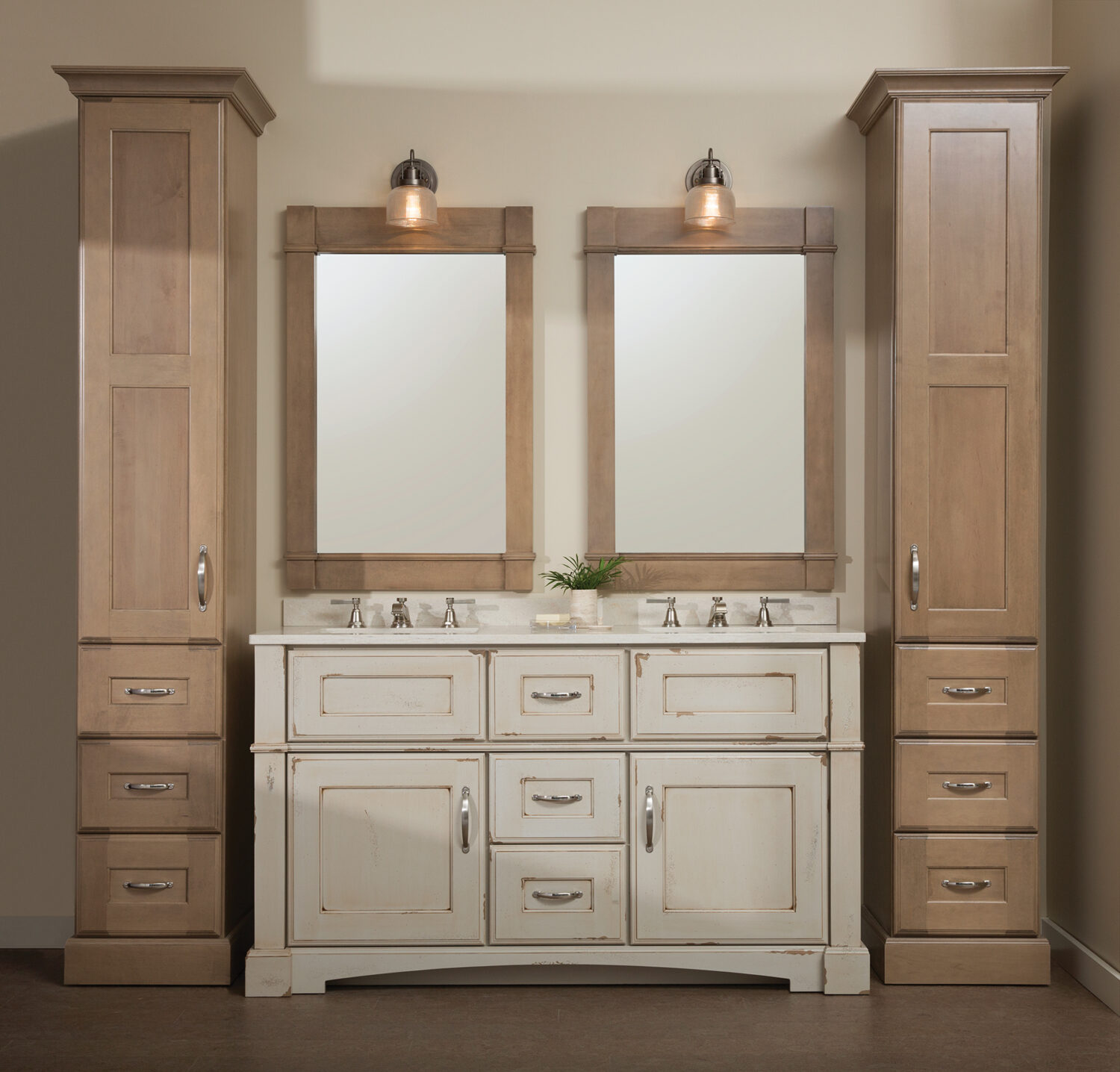 A rustic, shabby chic styled bathroom furniture collection with one double sink vanity and two free-standing linen cabinets on each side.