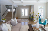 A look across the living room showing the french doors in the front entryway.