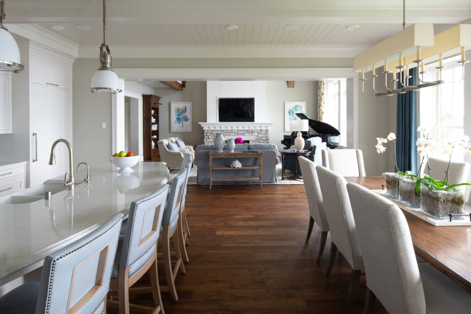 A look out to the living room from the kitchen in a East Coast Shingle styled home.