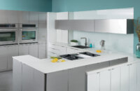 A modern kitchen design with glossy and contemporary cabinets the look similar to stainless steel and white high gloss acrylic cabinets.