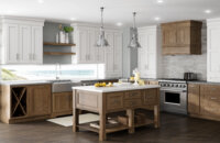 A kitchen layout idea in an L-Shaped kitchen design with a farm table style kitchen island using Standard overlay cabinet doors.