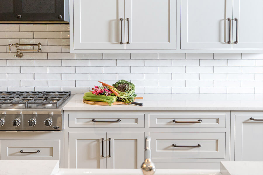Common activities that take place in the Prep Zone include everyday tasks of washing, peeling, cutting, chopping, measuring, and mixing ingredients. It is optimal for the Prep Zone to be in close proximity to the refrigerator and a sink.