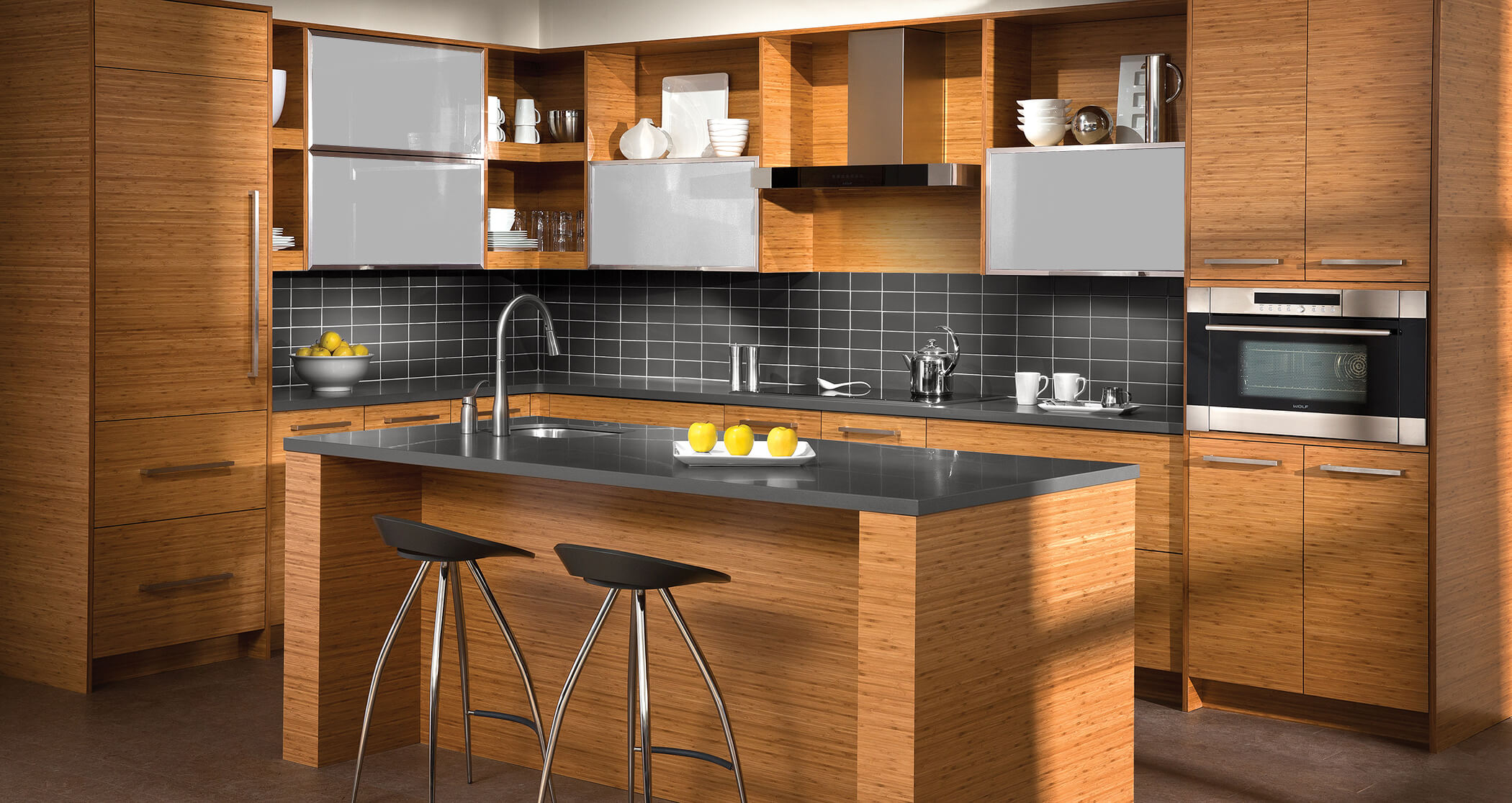 A modern kitchen with bamboo cabinets with a horizontal grain pattern.