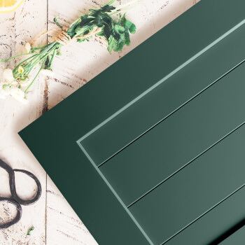 A deep forest green painted cabinet door with a shiplap styled center panel. Dura Supreme Cabinetry's Personal Paint Match Program offers the entire Sherwin-William’s paint palette AND Benjamin Moore paint palette , over 5,000 colors, for your new kitchen or bath cabinetry.
