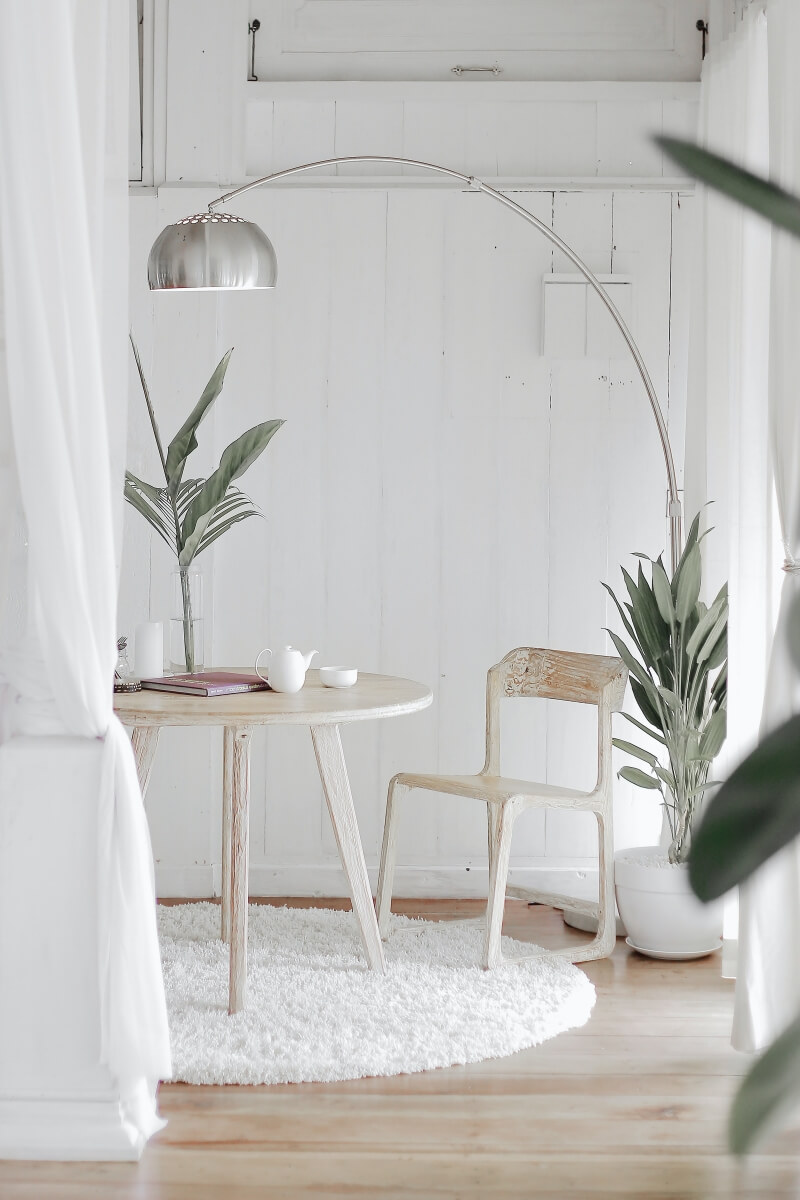 White washed and well worn woods in this simple table and chair