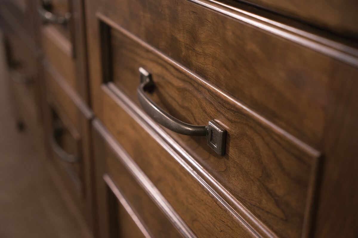 Close Up of Dura Supreme Stained finish on cabinet drawers.