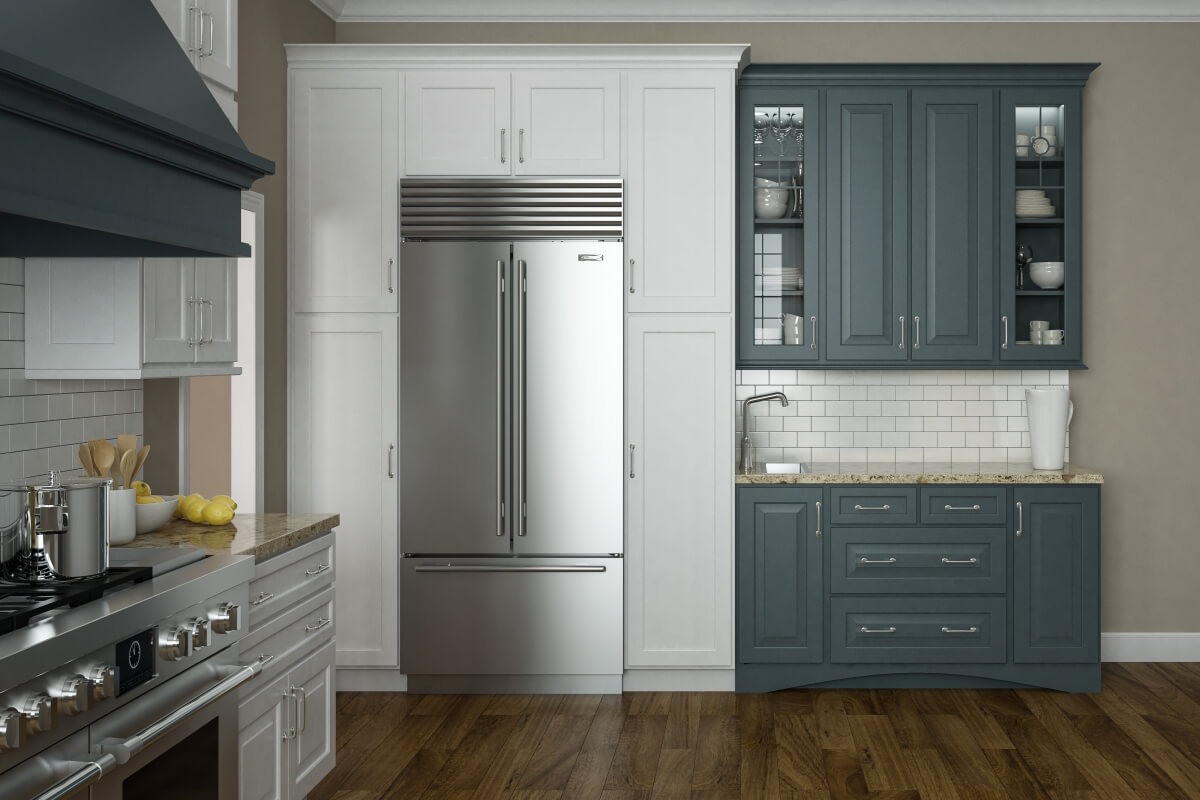 A two-toned painted kitchen remodel with a combination of white and dark blue painted cabinets with a modern farmhouse vibe..