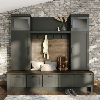 An on-trend dark olive green cabinet paint colore shown on a entryway boot bench and locker built-in. Dura Supreme's Curated Color Collection of paint finishes. The Curated Color Collection is a selection of trending paint colors that will be updated as color trends shift. This color offering will always be fresh and current, and reflective of popular color trends for cabinetry and home interiors.