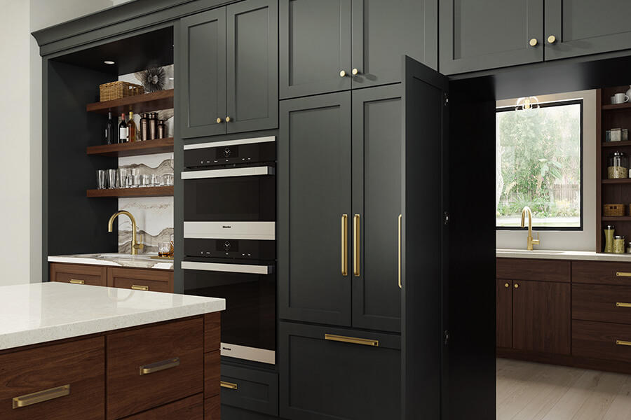 Semi-custom and custom cabinets with a high-end cabinet finish featuring a hidden walk-in pantry that is disguised by tall cabinet doors.