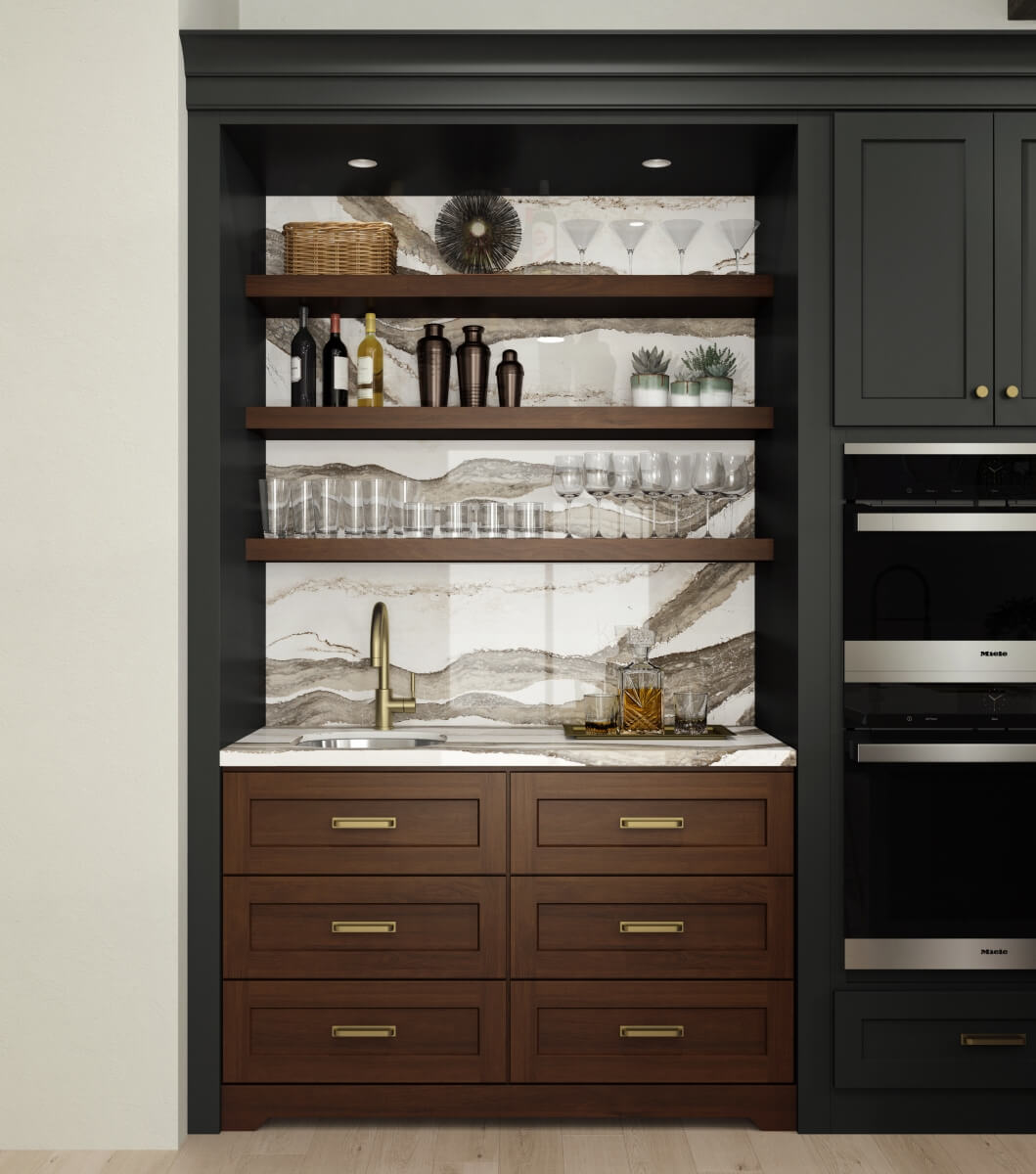 The stunning backsplash behind the floating shelves in this wet bar area adds more emphasis to this beautiful work zone.